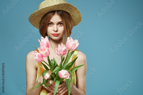Cheerful woman in hat bouquet of flowers elegance luxury studio cropped view © SHOTPRIME STUDIO
