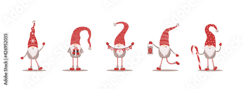 Cute gnomes in red santa hats on white background. Scandinavian christmas elves. Vector illustration in flat cartoon style. Nordic element design for greeting cards, season greetings, web, wrapper.
