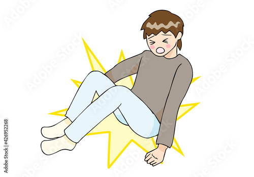 尻もちをついて転倒する男性