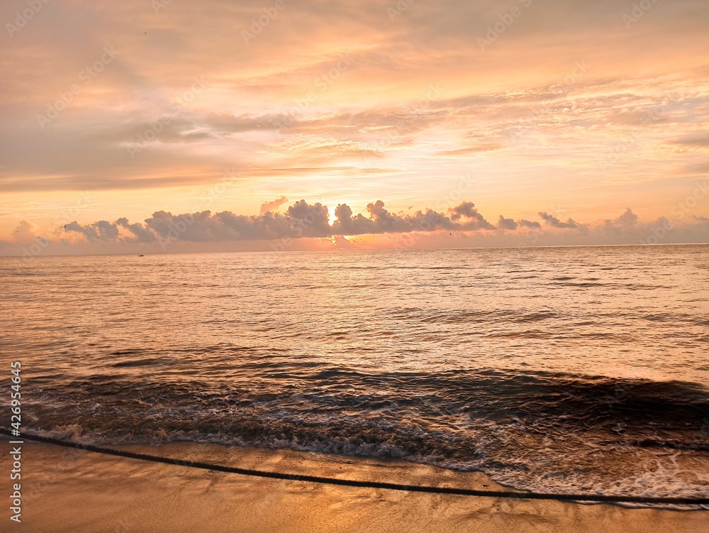 Naklejka premium sunset on the beach