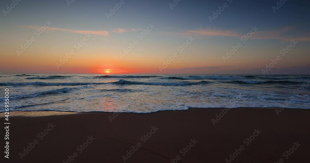 Beach on tropical island and colorful sunrise with dramatic clouds, 4k video Beach on tropical island and colorful sunrise with dramatic clouds, 4k video