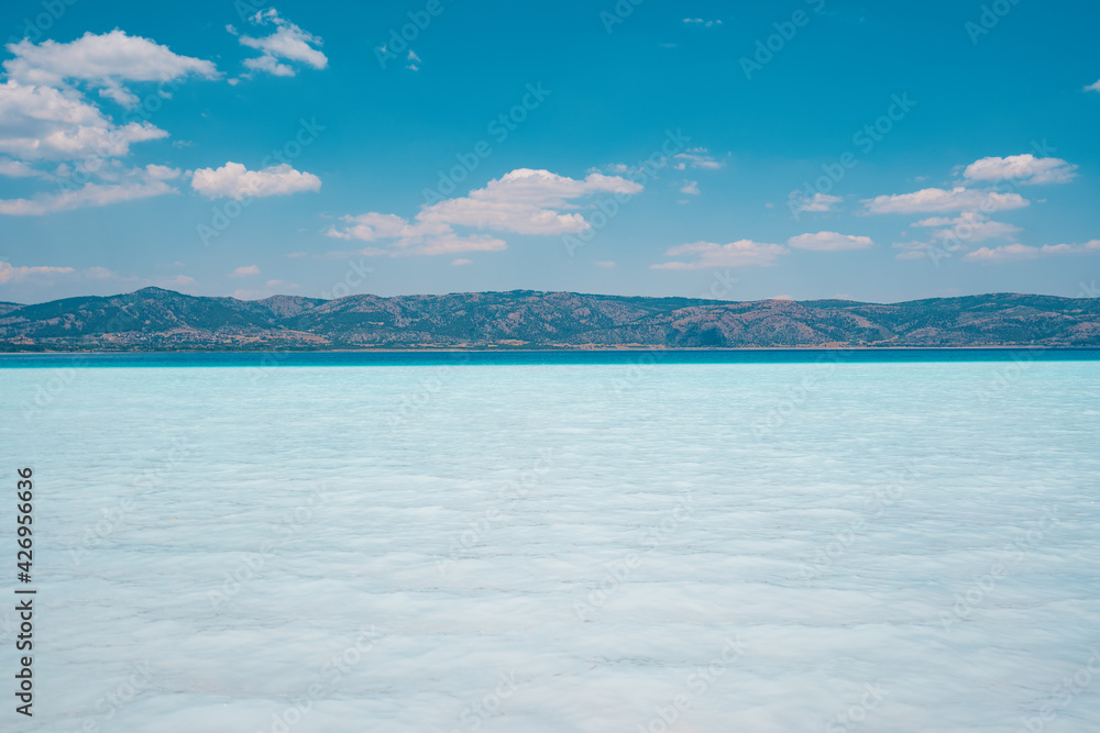Summer sunny day, blue sky, white clouds and water sea background. Blue Sky Background.