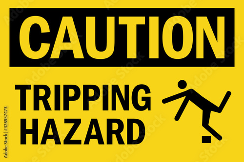 Tripping hazard caution sign. Black on yellow background. Health safety signs and symbols.