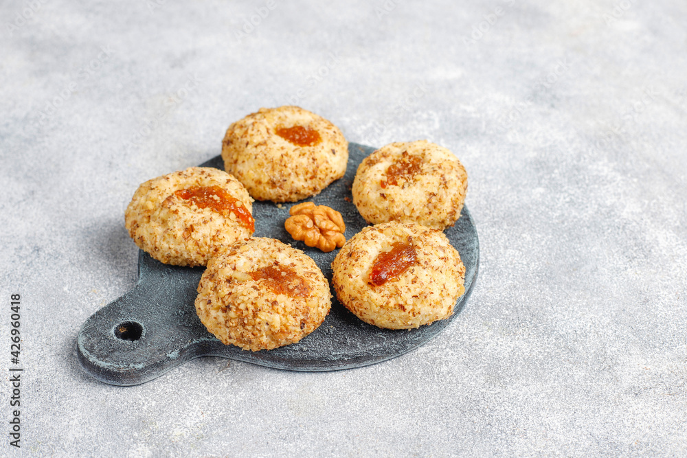 Delicious homemade walnut and jam cookies. Delicious homemade walnut and jam cookies.