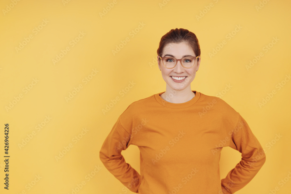Attractive young woman with a happy vivacious smile Attractive young woman with a happy vivacious smile