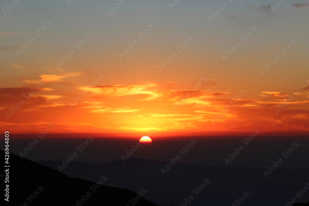 Dawn, Sunrise as seen from top of a Himalayan mountain