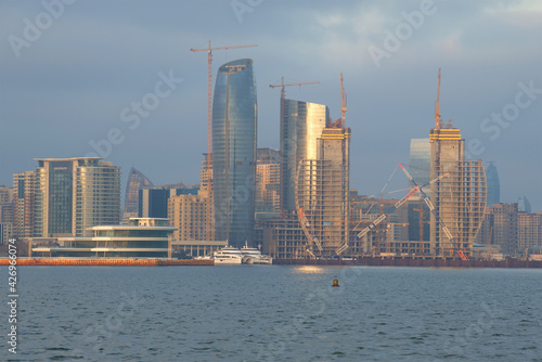 Construction of modern high-rise buildings on the shore of Baku Bay