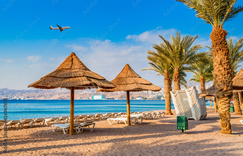 Morning on central public beach in Eilat - famous tourist resort and recreational city in Israel

