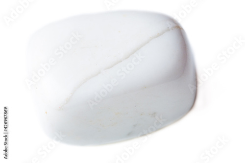 Cacholong stone close-up on white background photo