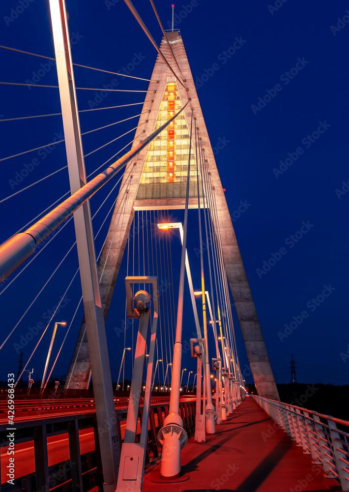 Madieri cable-stayed bridge in Budapest, evening twilight, bridge lighting Madieri cable-stayed bridge in Budapest, evening twilight, bridge lighting