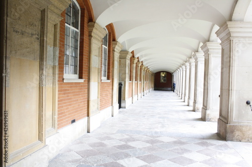 a corridor beside an open courtyard