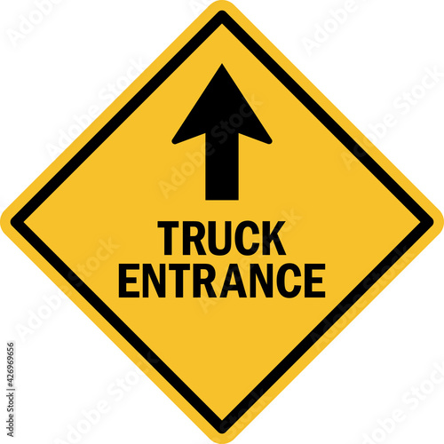 Truck entrance with up arrow sign. Black on yellow background. Safety signs and symbols.