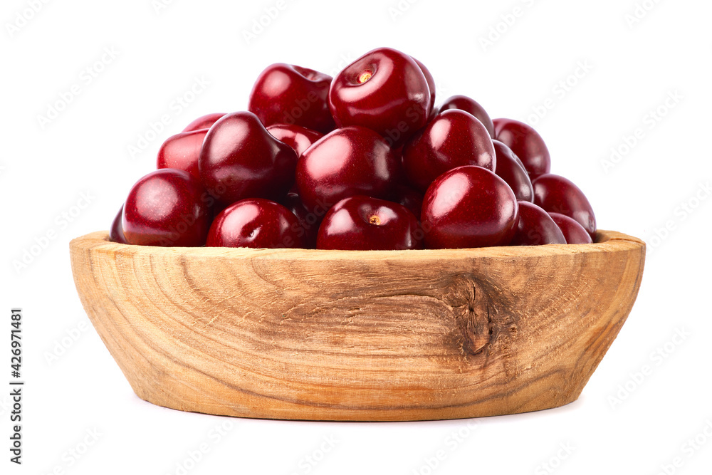 wooden bowl of sweet cherry fruits isolated on white background wooden bowl of sweet cherry fruits isolated on white background