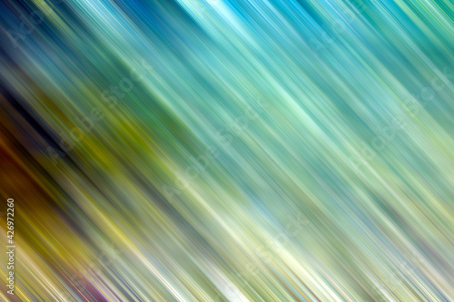 Background image providing motion blur with green, blue, yellow and brown strokes. © MeteBasar