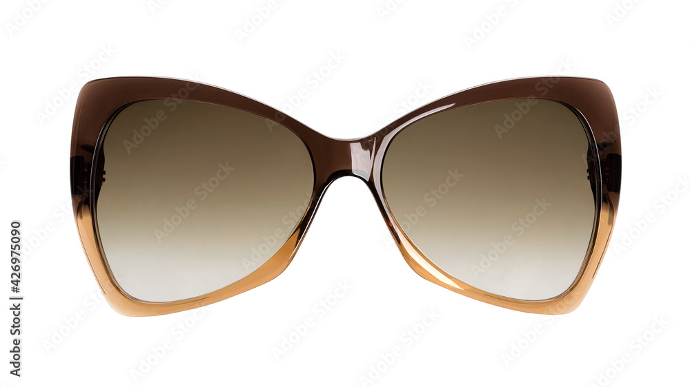 Elegant women's sunglasses with a translucent plastic frame isolated on a white background. Front view. Elegant women's sunglasses with a translucent plastic frame isolated on a white background. Front view.