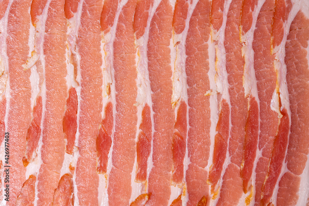 meat slicing close-up as background. top view meat slicing close-up as background. top view