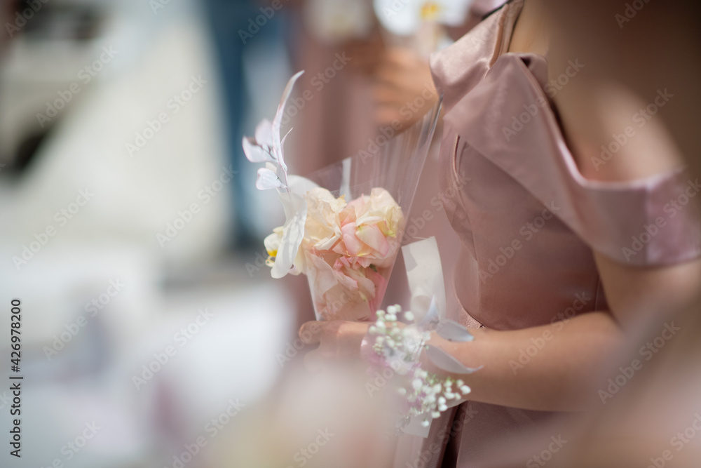 wedding flower on hand with blur background, bouquet flower wedding flower on hand with blur background, bouquet flower