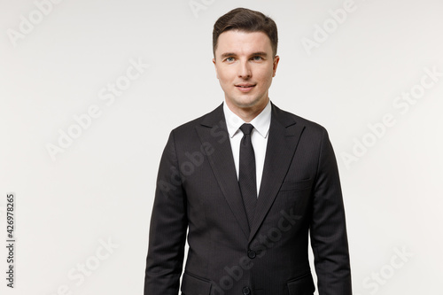 Young serious caucasian successful employee business corporate lawyer man 20s wear classic formal black grey suit shirt tie work in office isolated on white background studio portrait. Career concept.