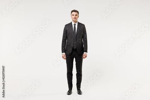 Full length young happy caucasian successful employee business corporate lawyer man 20s wearing classic formal black grey suit shirt tie work in office isolated on white background studio portrait