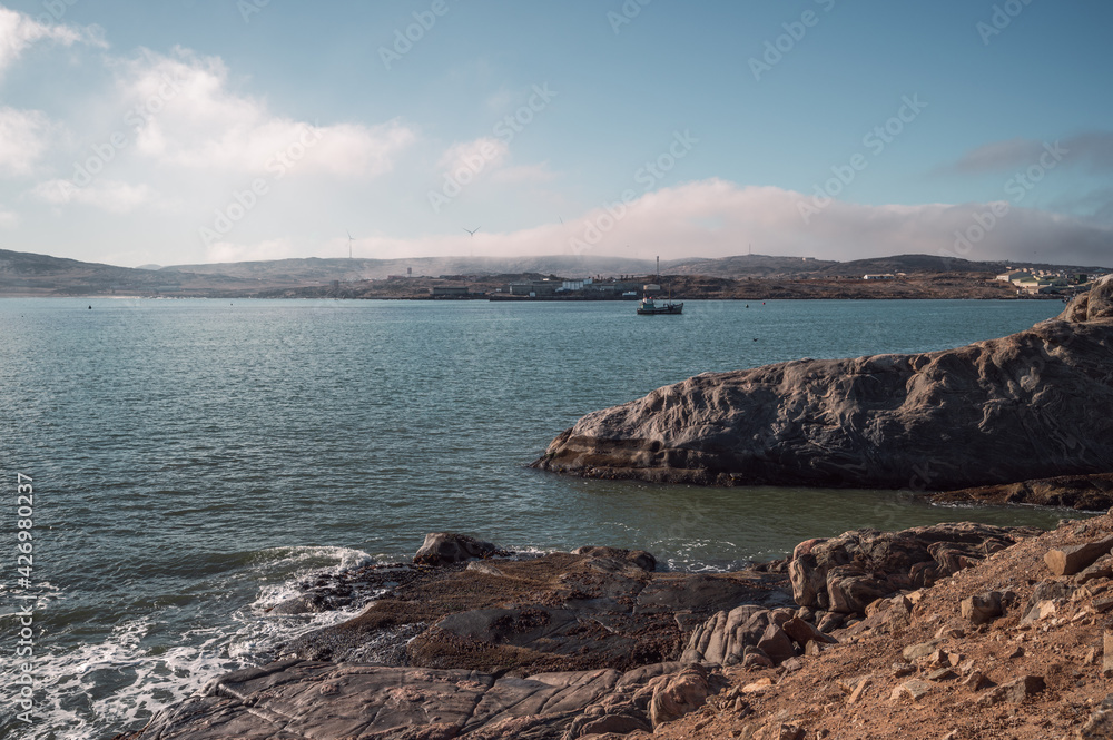 The port on the Atlantic coast of Africa and the natural scenery of the coastline.