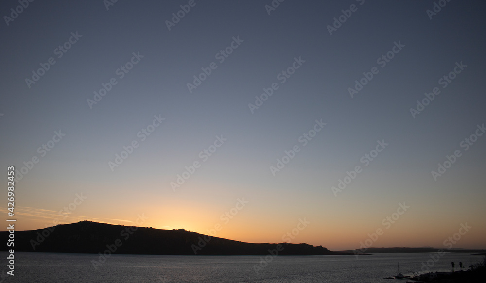 Beautiful sunset over Langebaan Lagoon and Mountains on Cape West Coast of South Africa.