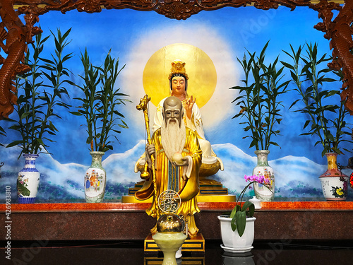 Statue of Guanyin and Chinese religious god in the Chinese shrine