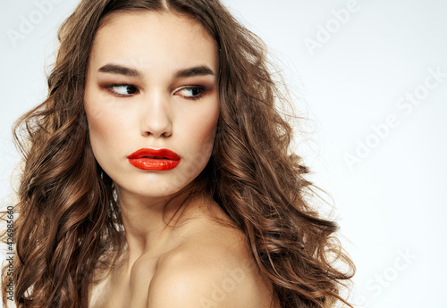Woman model hairstyle makeup curls eye shadow portrait