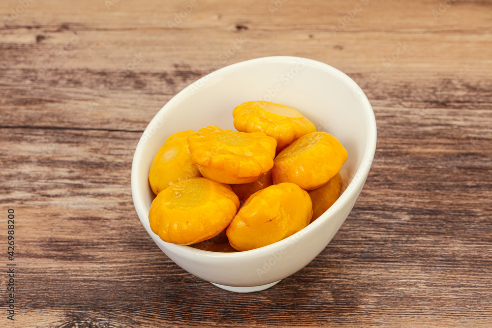 Marinated yellow patisson in the bowl Marinated yellow patisson in the bowl