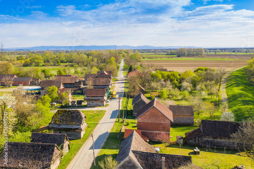 Aerial view of old traditional village of Krapje with typical wooden houses, Lonjsko polje, Croatia photo