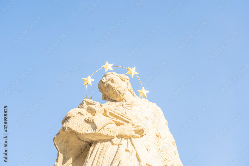 Obraz premium August 2020. in Bielsko Biala, Silesia, Poland. Statue outside the Roman Catholic Church of Divine Providence in Bielsko Biala, Poland