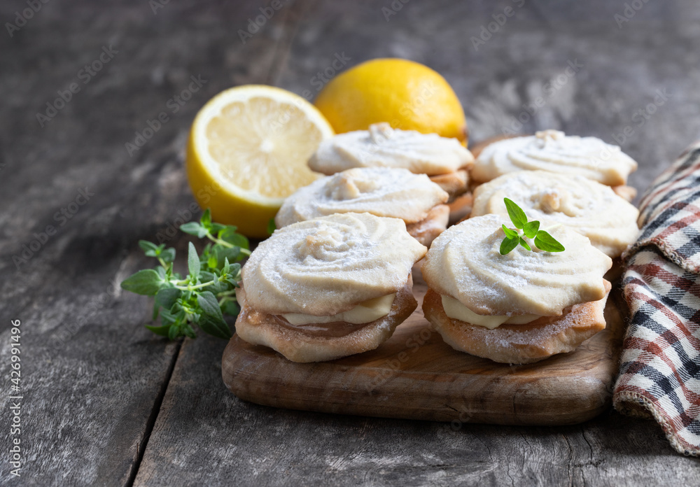 Delicious shortcakes with lemon and cream filling Delicious shortcakes with lemon and cream filling