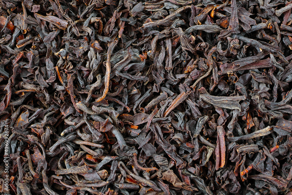 macro of black loose long leaf tea, loose tea texture macro of black loose long leaf tea, loose tea texture