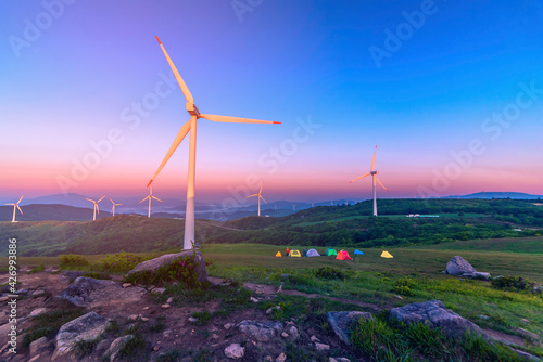 Sunrise The wind turbine field seonjaryeong mountain,seoul korea.
