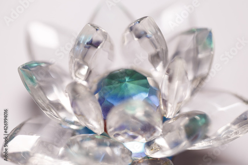 Traditional beautiful flower glass decorations. Macrophotography. Crystal Flower on white background. Decoration
