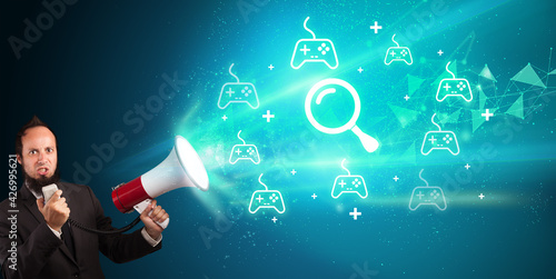 Young person with megaphone and technology related icon