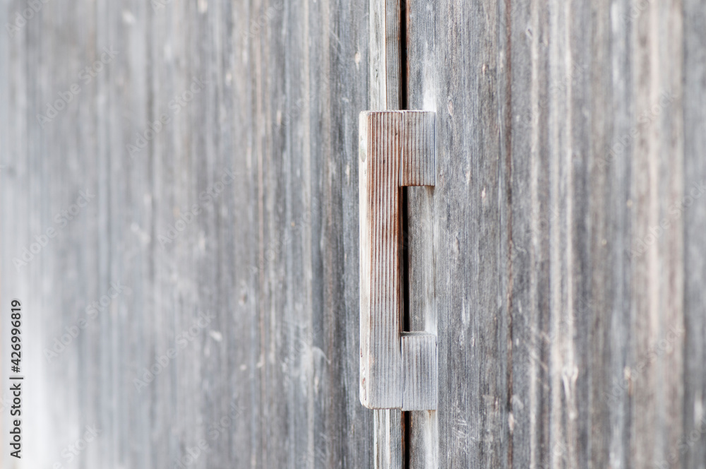 Wooden handle on a barn door