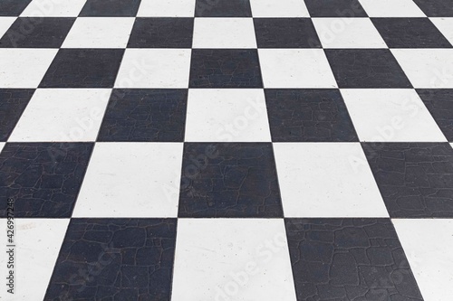 White and black indoor ceramic tile floor pattern and background seamless