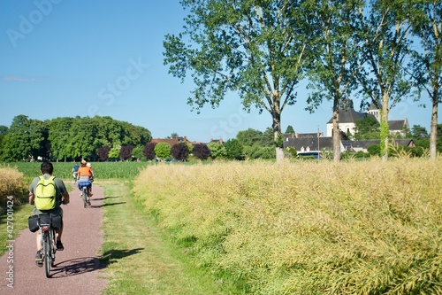 persons riding a bicycle