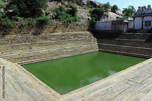 An Ancient water pond known as Pushkarni in Hinduism to store water during the rainy season and use it for daily chores, it is very common in India to have these ponds in every temple town.
