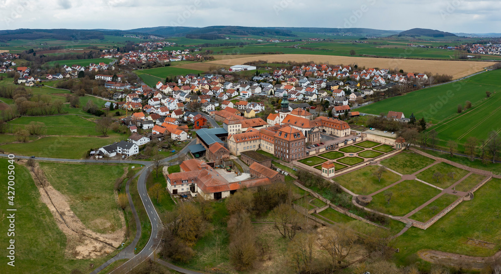 Aerial view of the village and monastery Johannesberg in Germany, Hesse on an early spring 