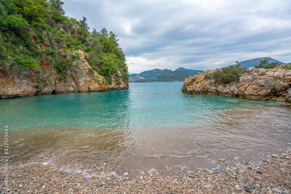 Korsan Koyu (Pirate Bay), was a bay where ships would gather to shelter from storms and is a favorite spot for camping enthusiasts on the Lycian way trekking, Antalya