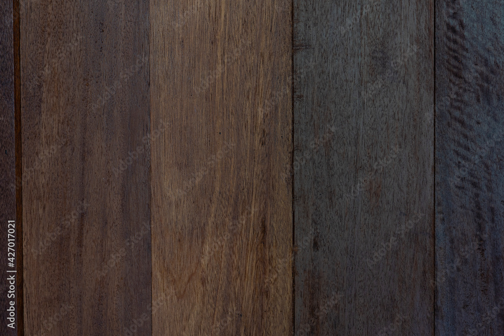 Naklejka premium Background and textured of wood panels are painted with dark lacquer.