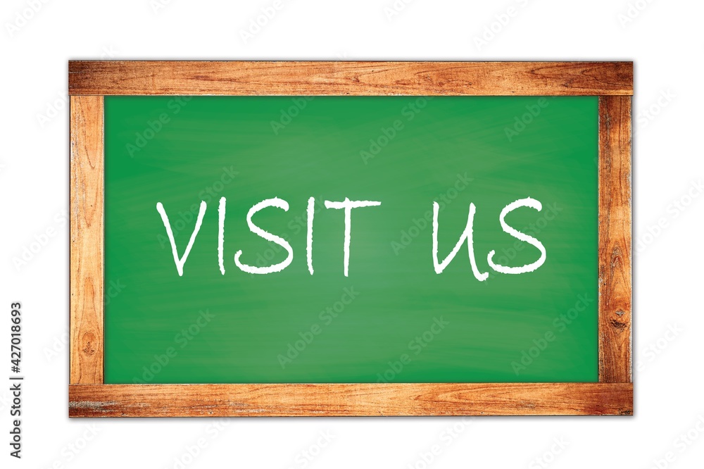 VISIT US text written on green school board. VISIT US text written on green school board.