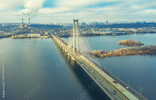 Aerial view from drone on South Bridge in Kiev, city skyline and landscape of Dnipro river, Ukraine