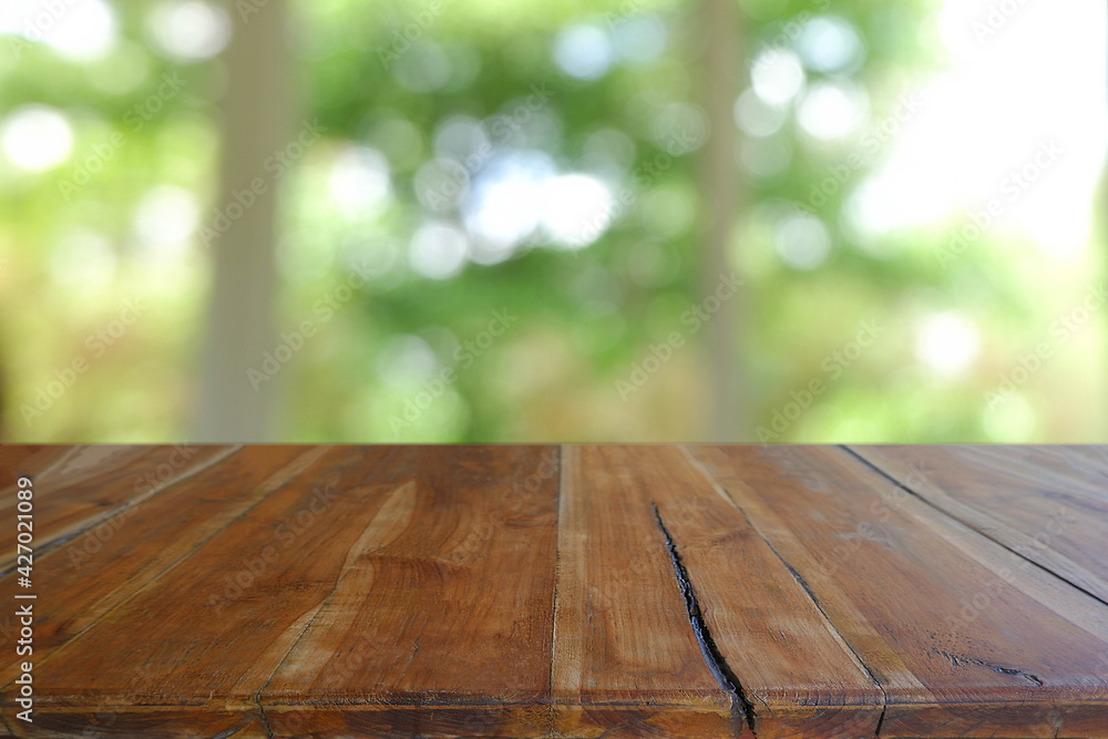 Empty wooden table in front of abstract blurred Cafe, restaurant at night. For montage product display or design key visual layout - Image Empty wooden table in front of abstract blurred Cafe, restaurant at night. For montage product display or design key visual layout - Image