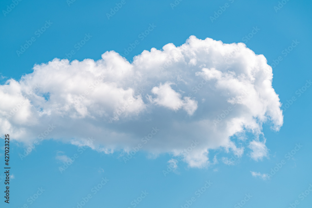 One fluffy cloud on blue sky One fluffy cloud on blue sky