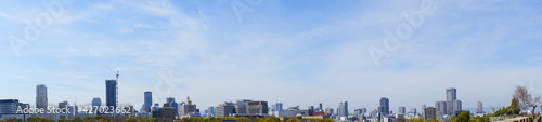 City landscape of Osaka, Japan from Osaka castle park. Panoramic view during spring. - 大阪の都市景観 大阪城公園から
