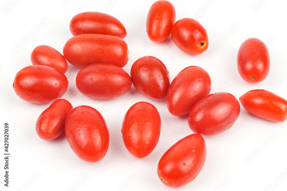Cherry tomatoes isolated on white background
