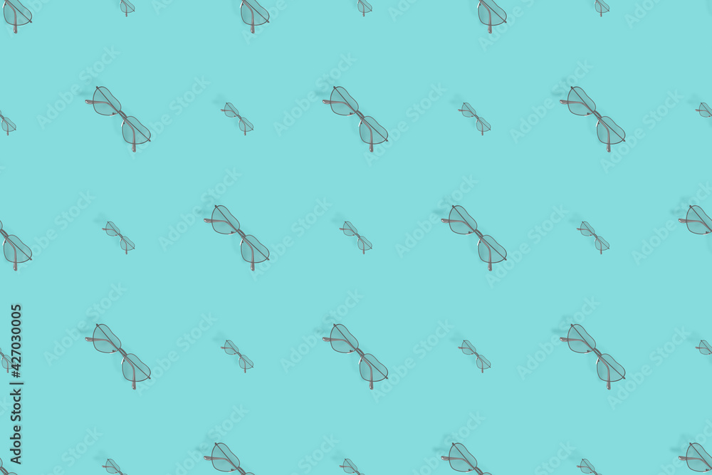Fototapeta premium Glasses seamless pattern. Background from glasses for sight on a bright background. 