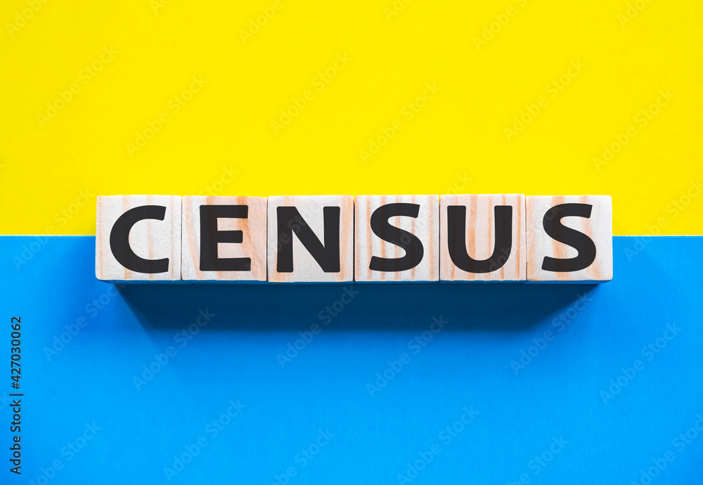 Word CENSUS on wooden cubes with word on beautiful yellow and blue background. Business, media marketing concept. official count or survey of population, recording details of individuals Word CENSUS on wooden cubes with word on beautiful yellow and blue background. Business, media marketing concept. official count or survey of population, recording details of individuals